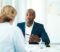 Defocused shot of a woman meeting with a professional businessman