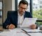 Person reviewing a denied California personal injury insurance claim with legal documents